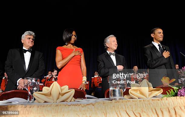 President Barack Obama , Matt Winkler from Bloomberg News ,First Lady Michelle Obama and comedian Jay Leno stand during the White House...