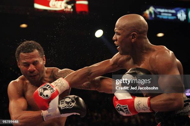 Floyd Mayweather Jr. Throws a right to the head of Shane Mosley during the welterweight fight at the MGM Grand Garden Arena on May 1, 2010 in Las...