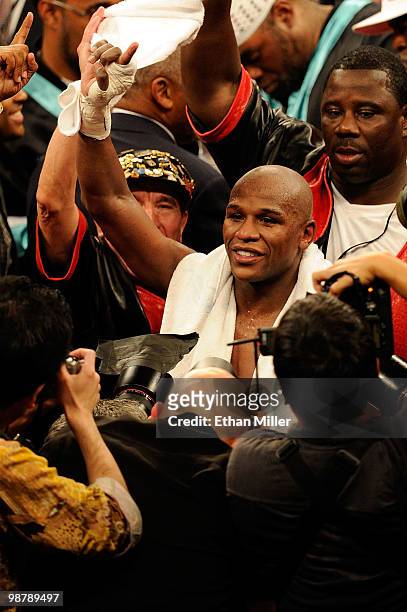 Floyd Mayweather Jr. Reacts after defeating Shane Mosley by unanimous decision after the welterweight fight at the MGM Grand Garden Arena on May 1,...