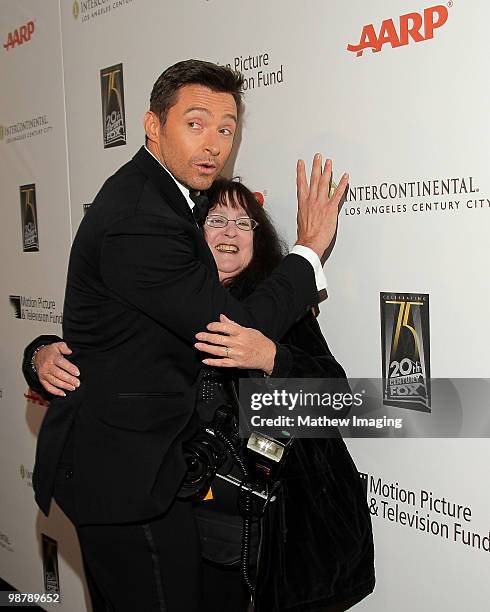 Actor Hugh Jackman and photographer Sue Schneider at the 5th Annual "A Fine Romance" at 20th Century Fox on May 1, 2010 in Los Angeles, California.
