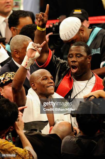 Floyd Mayweather Jr. Reacts after defeating Shane Mosley by unanimous decision after the welterweight fight at the MGM Grand Garden Arena on May 1,...