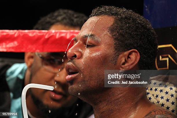 Shane Mosley drinks water in his corner during a round break against Floyd Mayweather Jr. During the welterweight fight at the MGM Grand Garden Arena...