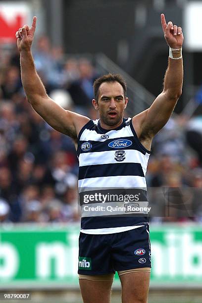 James Podsiadly of the Cats celebrates kicking a goal during the round six AFL match between the Geelong Cats and the Richmond Tigers at Skilled...