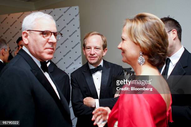 Steven Rattner, former head of the U.S. Treasury department's auto task force, center, and David Rubenstein, founder and managing director of the...