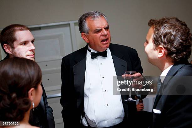 Ray LaHood, U.S. Transportation secretary, center, attends a Bloomberg cocktail party prior to the White House Correspondents' Association dinner in...