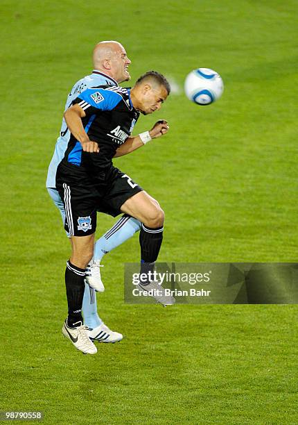 Jason Hernandez of the San Jose Earthquakes heads the ball back downfield against Conor Casey of the Colorado Rapids in the second half on May 1,...