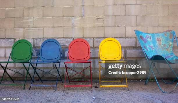 odd one out - one empty desk stock pictures, royalty-free photos & images