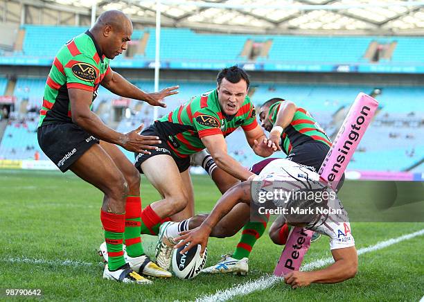 Steve Matai of the Eagles is pushed into touch before he can ground the ball during the round eight NRL match between the South Sydney Rabbitohs and...