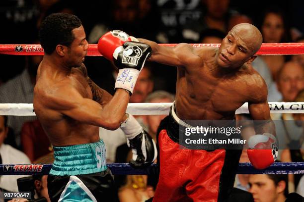 Floyd Mayweather Jr. Throws a right to the head of Shane Mosley during the welterweight fight at the MGM Grand Garden Arena on May 1, 2010 in Las...