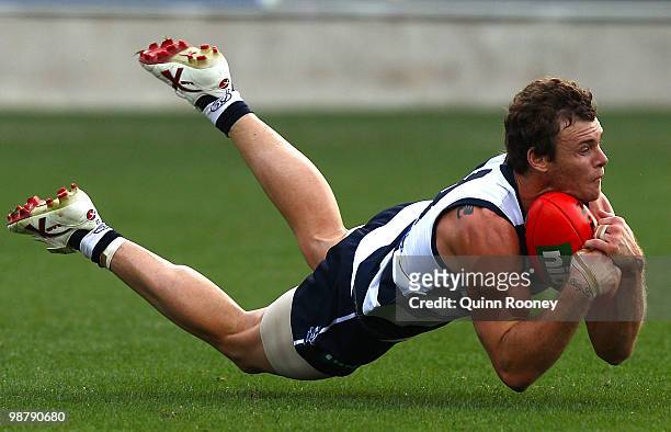 Cameron Mooney of the Cats marks during the round six AFL match between the Geelong Cats and the Richmond Tigers at Skilled Stadium on May 2, 2010 in...