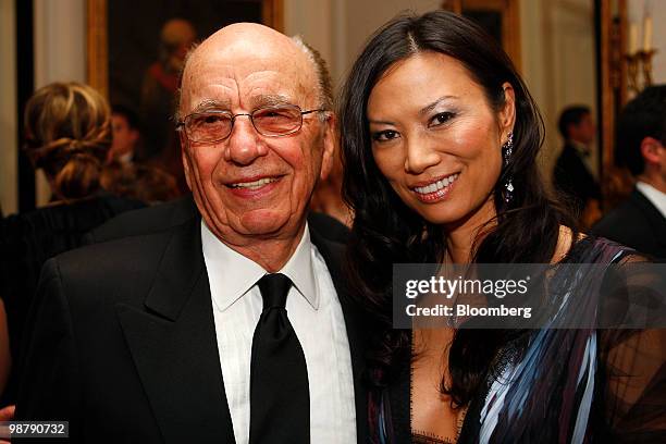 Rupert Murdoch, chairman and chief executive officer of News Corp., left, and his wife Wendi Deng attend the Bloomberg Vanity Fair White House...