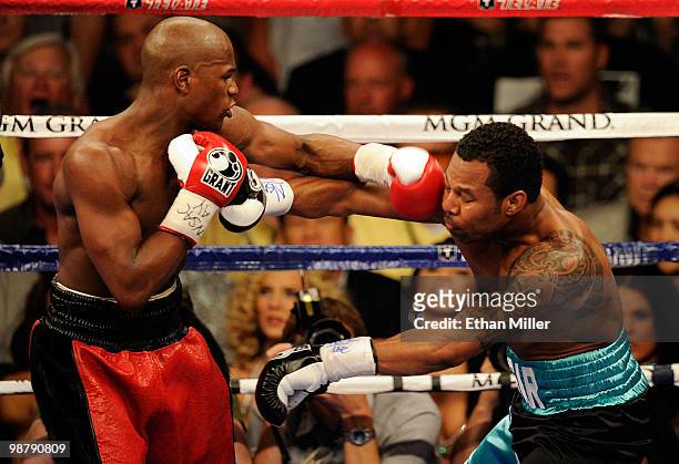 Floyd Mayweather Jr. Throws a left to the face of Shane Mosley fight during the welterweight fight at the MGM Grand Garden Arena on May 1, 2010 in...