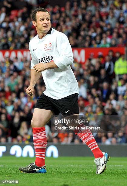 Austin Healey plays football at United For Relief: The Big Red Family Day Out at Old Trafford on May 1, 2010 in Manchester, England.