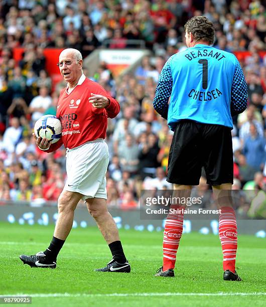 Sir Bobby Charlton and Dave Beasant play football at United For Relief: The Big Red Family Day Out at Old Trafford on May 1, 2010 in Manchester,...