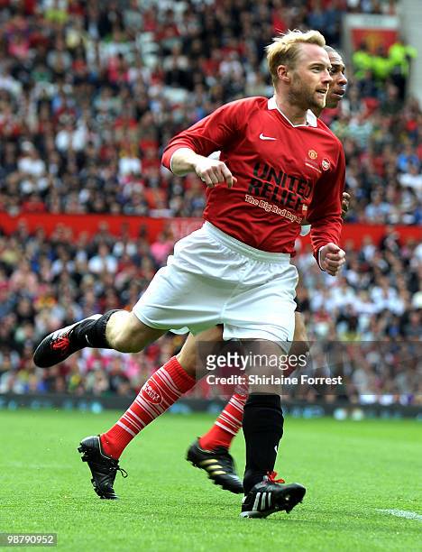 Ronan Keating plays football at United For Relief: The Big Red Family Day Out at Old Trafford on May 1, 2010 in Manchester, England.
