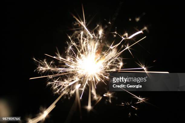 sparks - sparkler stock pictures, royalty-free photos & images