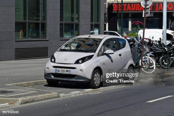 bluecar vehicle on the parking - bluecar stock pictures, royalty-free photos & images