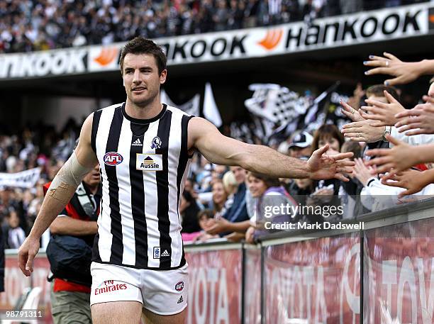 Darren Jolly of the Magpies thanks fans after their win in the round six AFL match between the Carlton Blues and the Collingwood Magpies at Melbourne...