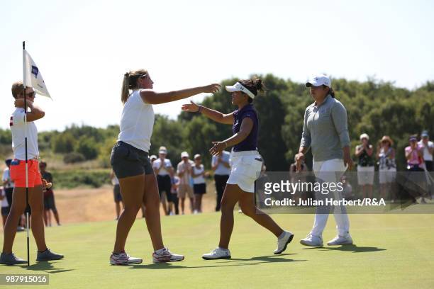 Leonie Harm of Germany embraces Stephanie Lau of The USA after winning the final on day five of The Ladies' British Open Amateur Championship at...