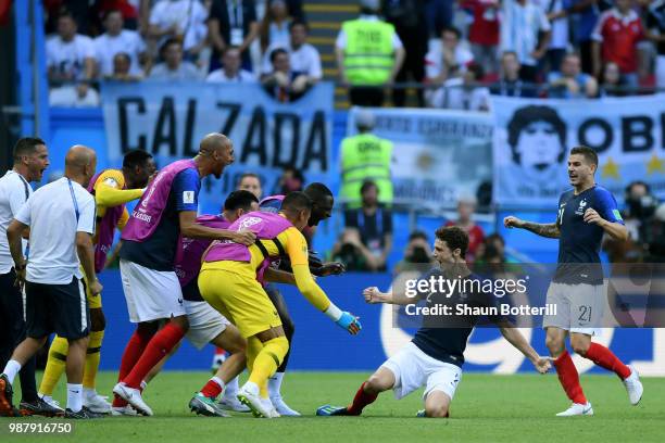 Benjamin Pavard of France celebrates with teammates after scoring his team's second goal during the 2018 FIFA World Cup Russia Round of 16 match...