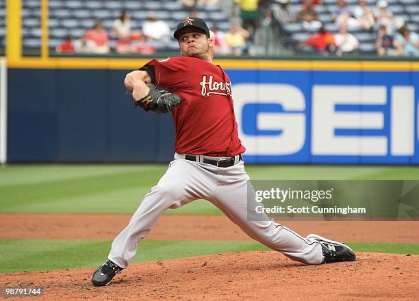 Wandy Rodriguez of the Houston Astros pitches against the Atlanta Braves at Turner Field on May 1, 2010 in Atlanta, Georgia. The Braves defeated the...