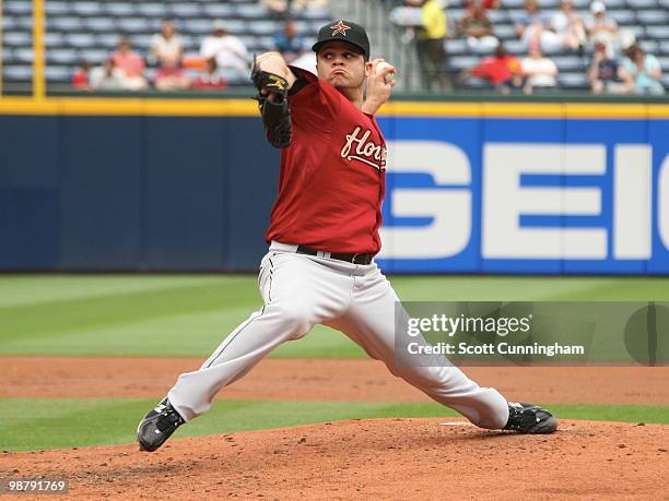 Wandy Rodriguez of the Houston Astros pitches against the Atlanta Braves at Turner Field on May 1, 2010 in Atlanta, Georgia. The Braves defeated the...