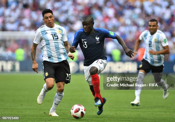 Enzo Perez of Argentina and Ngolo Kante of France battle for the ball during the 2018 FIFA World Cup Russia Round of 16 match between France and...