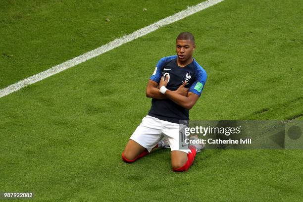 Kylian Mbappe of France celebrates after scoring his team's third goal during the 2018 FIFA World Cup Russia Round of 16 match between France and...