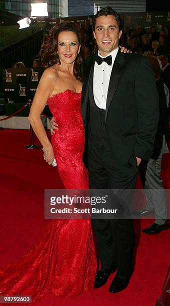 Personality and singer Rhonda Burchmore and partner arrive at the 52nd TV Week Logie Awards at Crown Casino on May 2, 2010 in Melbourne, Australia.