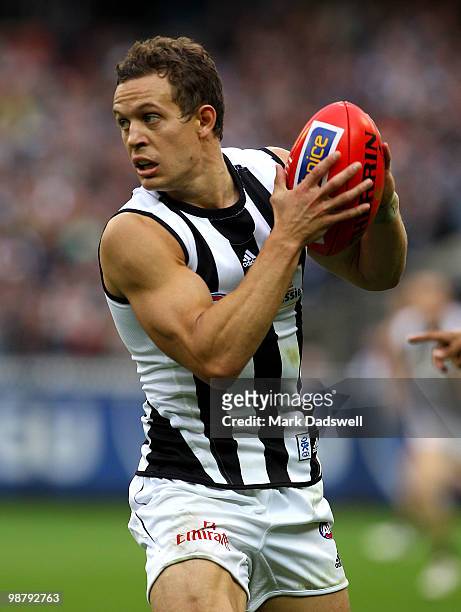 Luke Ball of the Magpies gathers the ball during the round six AFL match between the Carlton Blues and the Collingwood Magpies at Melbourne Cricket...