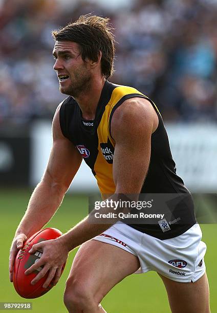 Chris Newman of the Tigers kicks during the round six AFL match between the Geelong Cats and the Richmond Tigers at Skilled Stadium on May 2, 2010 in...