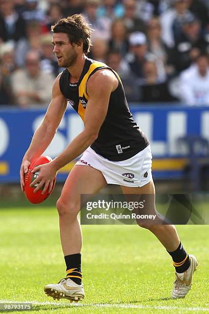 Chris Newman of the Tigers kicks during the round six AFL match between the Geelong Cats and the Richmond Tigers at Skilled Stadium on May 2, 2010 in...