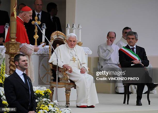 Cardinal Severino Poletto welcomes Pope Benedict XVI and Turin mayor Sergio Chiamparino as he arrived to celebrate a mass at San Carlo square in...