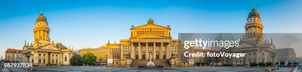 berlin gendarmenmarkt iconic historic square illuminated at sunrise panorama germany - deutscher dom stock pictures, royalty-free photos & images