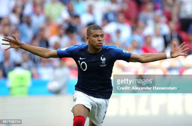 Kylian Mbappe of France celebrates after scoring his team's fourth goal during the 2018 FIFA World Cup Russia Round of 16 match between France and...