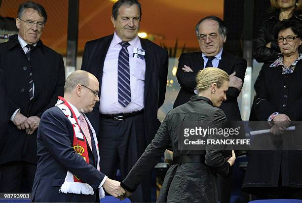 Prince Albert of Monaco and girlfriend Charlene Wittstock arrive in the VIP stand to attend the French Cup final football match Paris Saint-Germain...