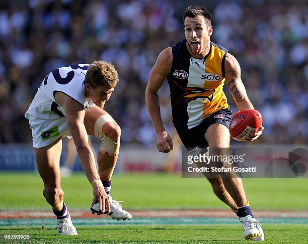 Chris Masten of the Eagles breaks away during the round six AFL match between the West Coast Eagles and the Fremantle Dockers at Subiaco Oval on May...