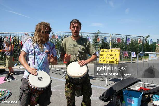 Two Protesters, One from Action group "Reclaim the Power" and the other, a Local Anti-Frack Protester, beat drums during a mass 48 Hour Protest Block...