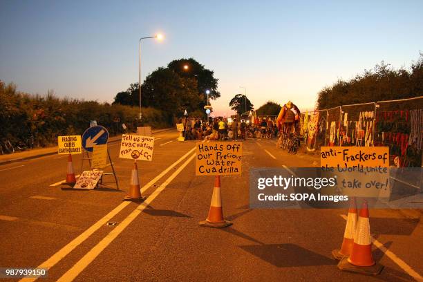 As Anti-Fracking protesters gather to watch a motivational film, outside Shale Gas Company "Cuadrilla's" Fracking Site, Road side signs visible to...