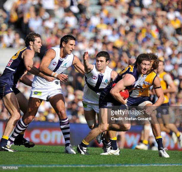 Patrick McGinnity of the Eagles breaks away during the round six AFL match between the West Coast Eagles and the Fremantle Dockers at Subiaco Oval on...