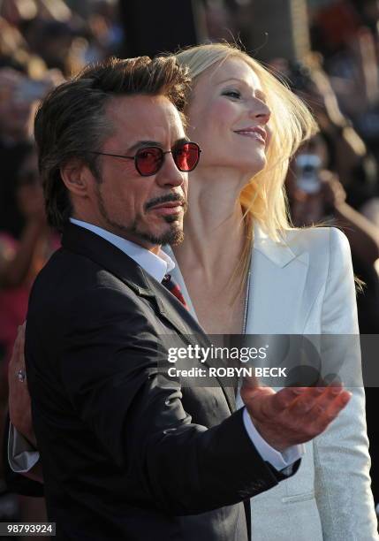 Actress Gwyneth Paltrow and actor Robert Downey Jr pose on the red carpet at the world premiere of Iron Man 2 at the El Capitan Theater n the...