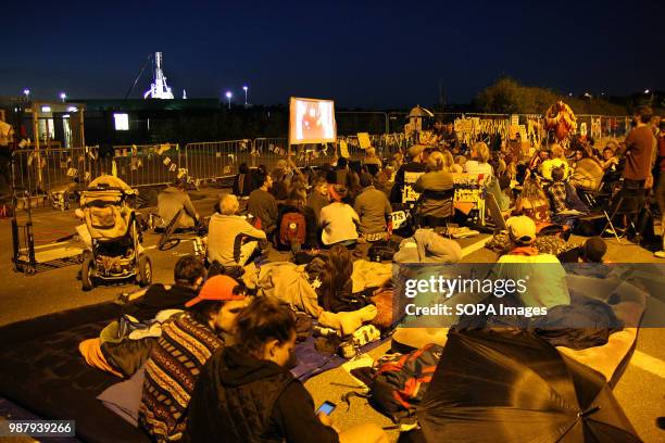 Midnight outside Shale Gas Company "Cuadrilla's" Frack site, shut down for 48 Hours by Anti Frack Protesters, who gather to watch an inspirational...