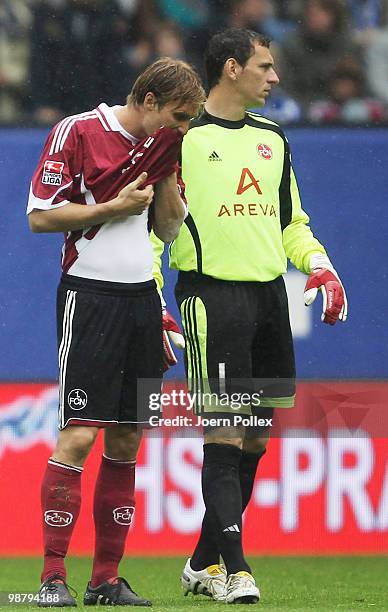 Andreas Ottl and Raphael Schaefer of Nuernberg are seen during during the Bundesliga match between Hamburger SV and 1. FC Nuernberg at HSH Nordbank...