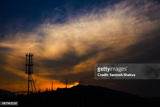 clouds after 7.8 rector scale earthquake in nepal - rector stock pictures, royalty-free photos & images