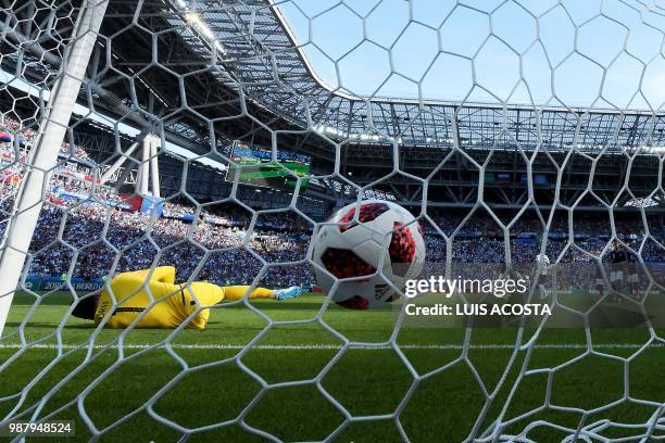 France's goalkeeper Hugo Lloris concedes a first goal to Argentina during the Russia 2018 World Cup round of 16 football match between France and...