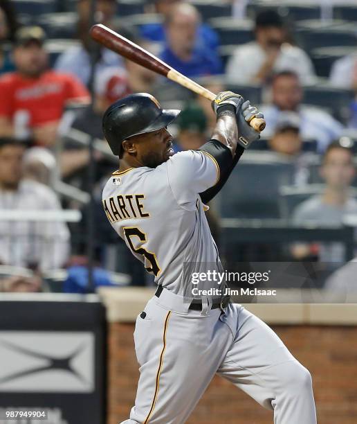 Starling Marte of the Pittsburgh Pirates in action against the New York Mets at Citi Field on June 26, 2018 in the Flushing neighborhood of the...