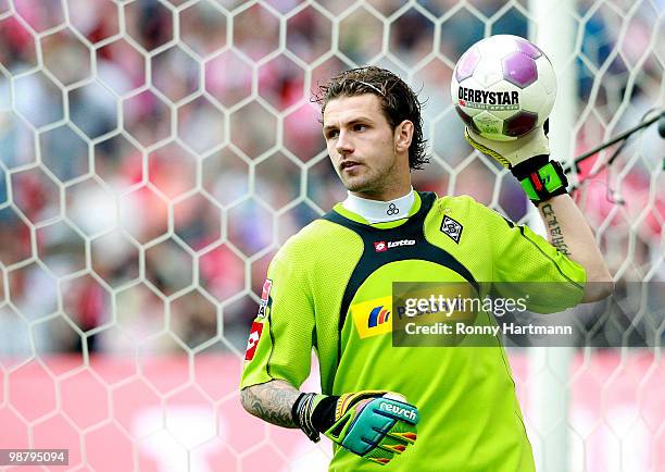 Goalkeeper Logan Bailly of Moenchengladbach holds the ball during the Bundesliga match between Hannover 96 and Borussia Moenchengladbach at AWD Arena...