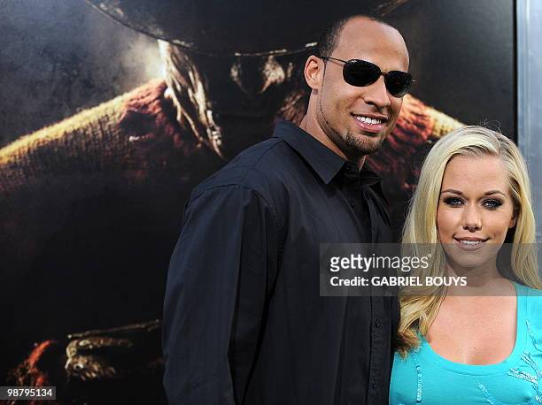 Playmate and actress Kendra Wilkinson and her husband, American football player Hank Baskett arrive at the World premiere of "A Nightmare on Elm...