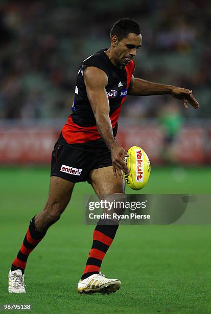 Nathan Lovett-Murray of the Bombers kicks during the round six AFL match between the Essendon Bombers and the Hawthorn Hawks at the Melbourne Cricket...