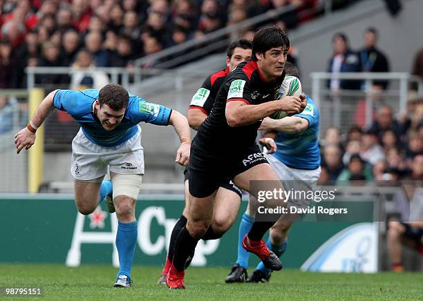 David Skrela of Toulouse breaks clear to score the second try during the Heineken Cup semi final match between Toulouse and Leinster at Stade...